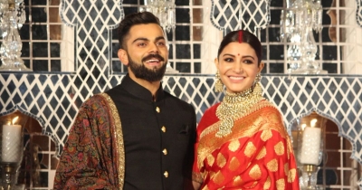 Virat Kohli and Anushka Sharma celebrate India's big Win